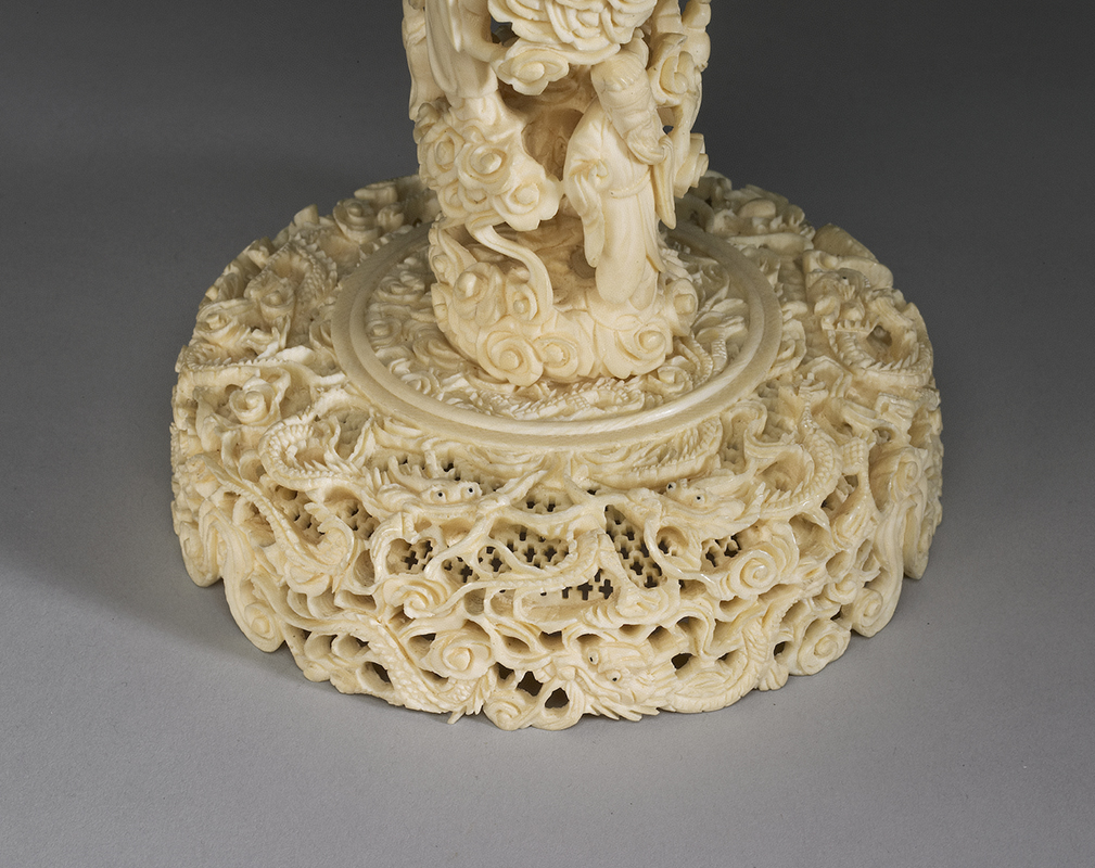 Set of carved openwork concentric ivory balls with cloud-and-dragon decoration”