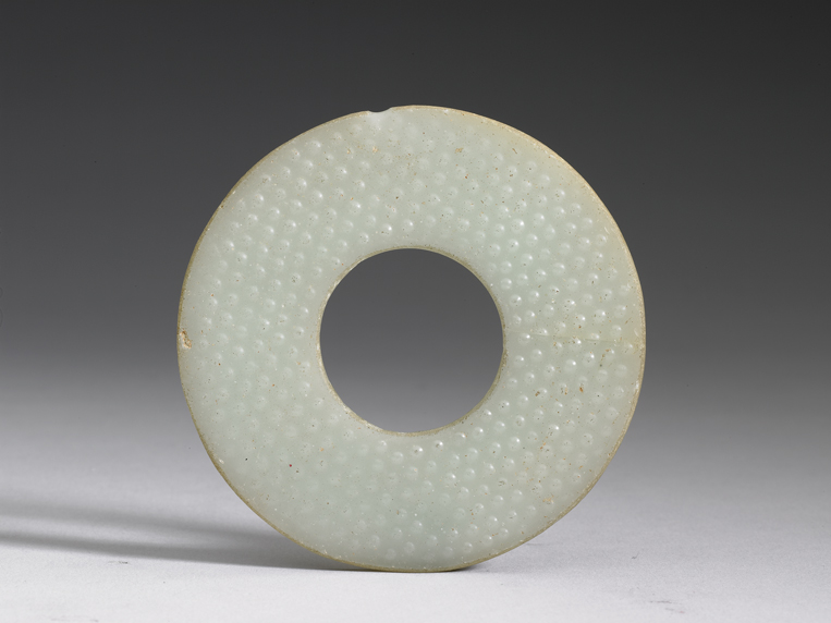 Double – sided glass Bi disc with engraved patterns Mid Warring States period to early Western Han dynasty
