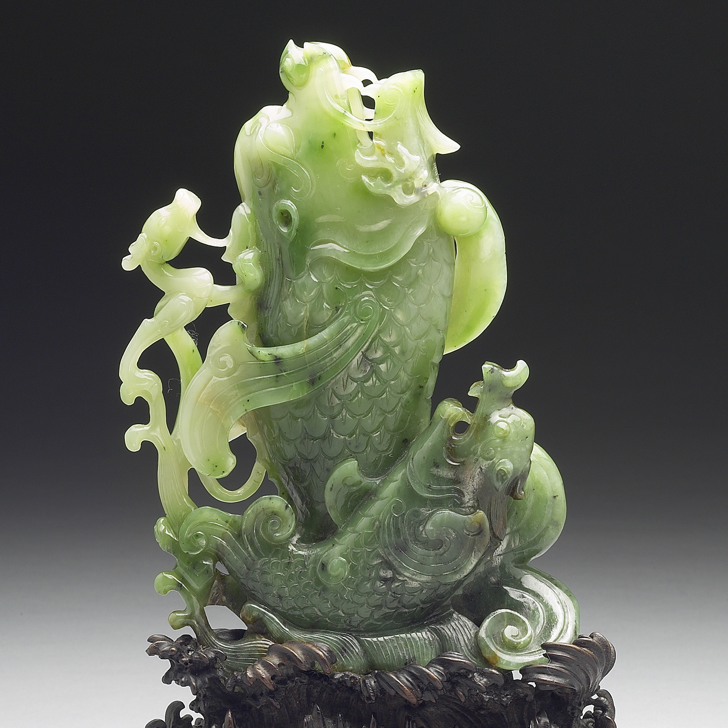 Dark-green jade fish-dragon flower holder