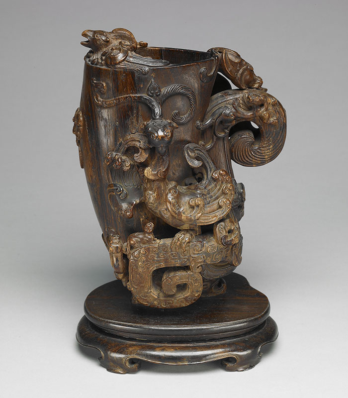 Carved agarwood gong vessel with dragon-and-phoenix decoration