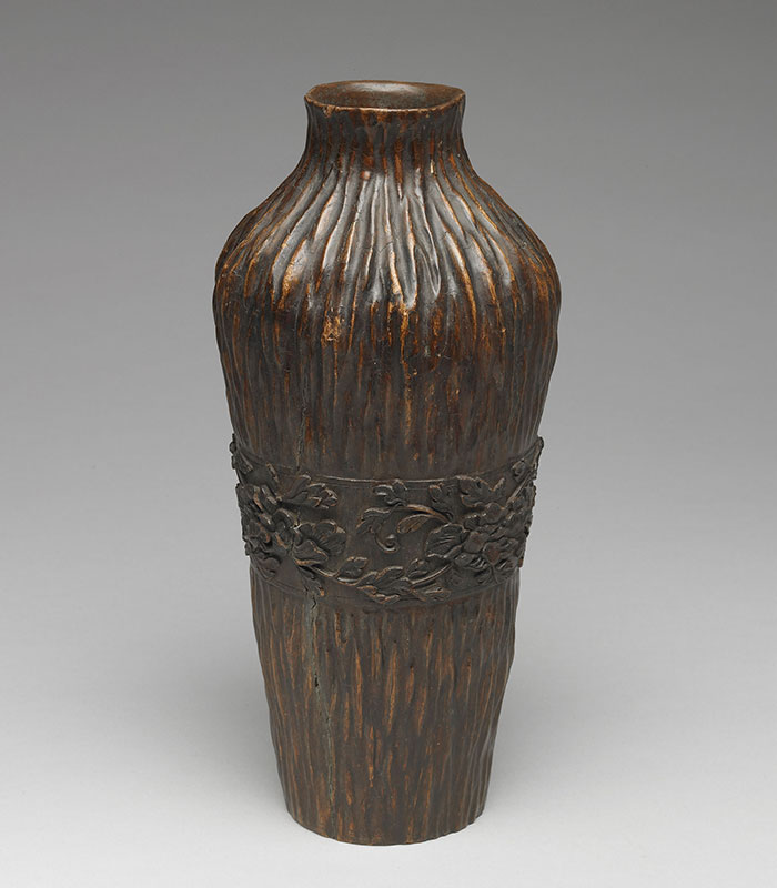Carved agarwood vase with peony decoration