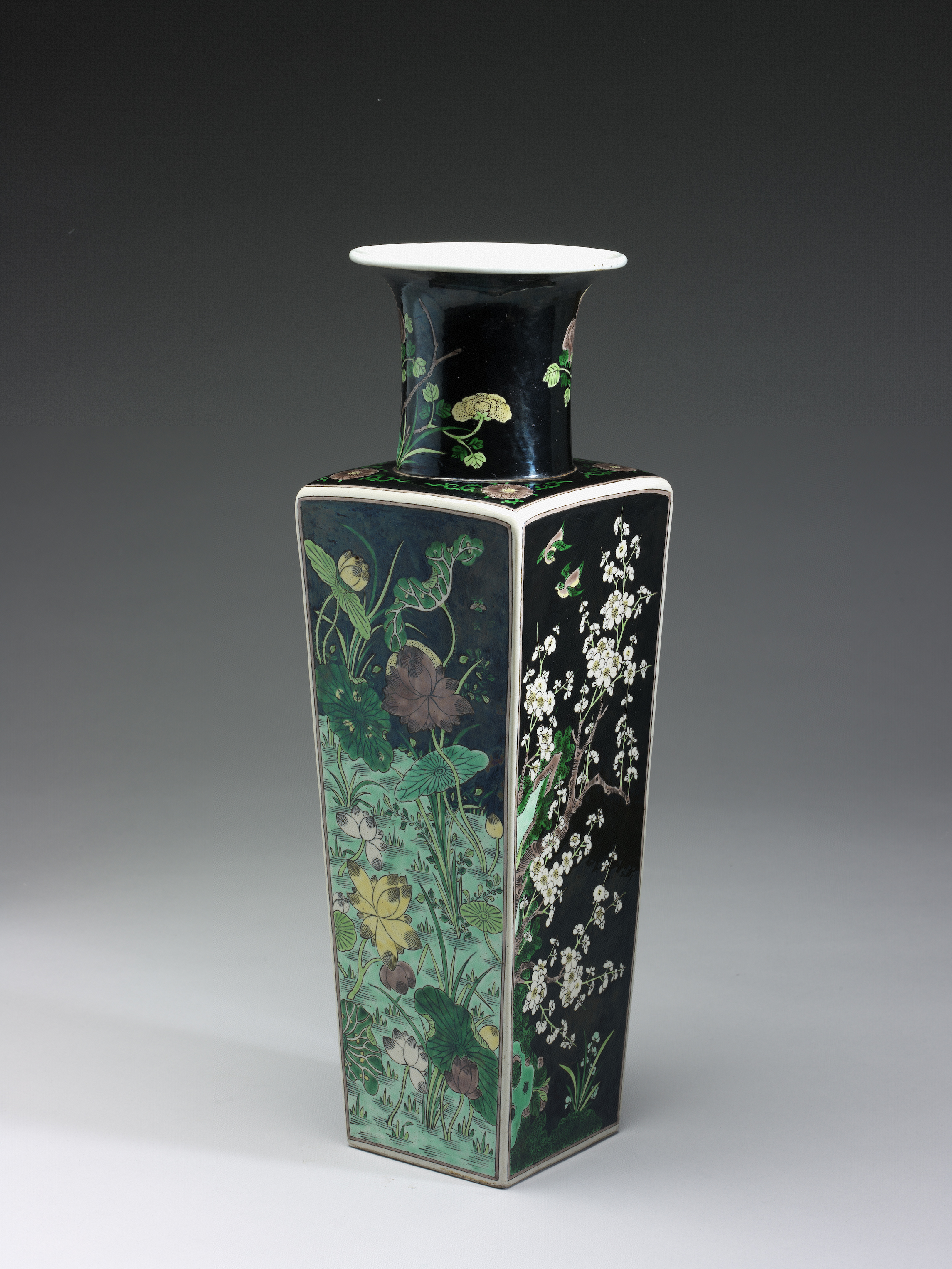 Square vase decorated with flower-and-bird pattern in three-color glaze of famille noire on black ground