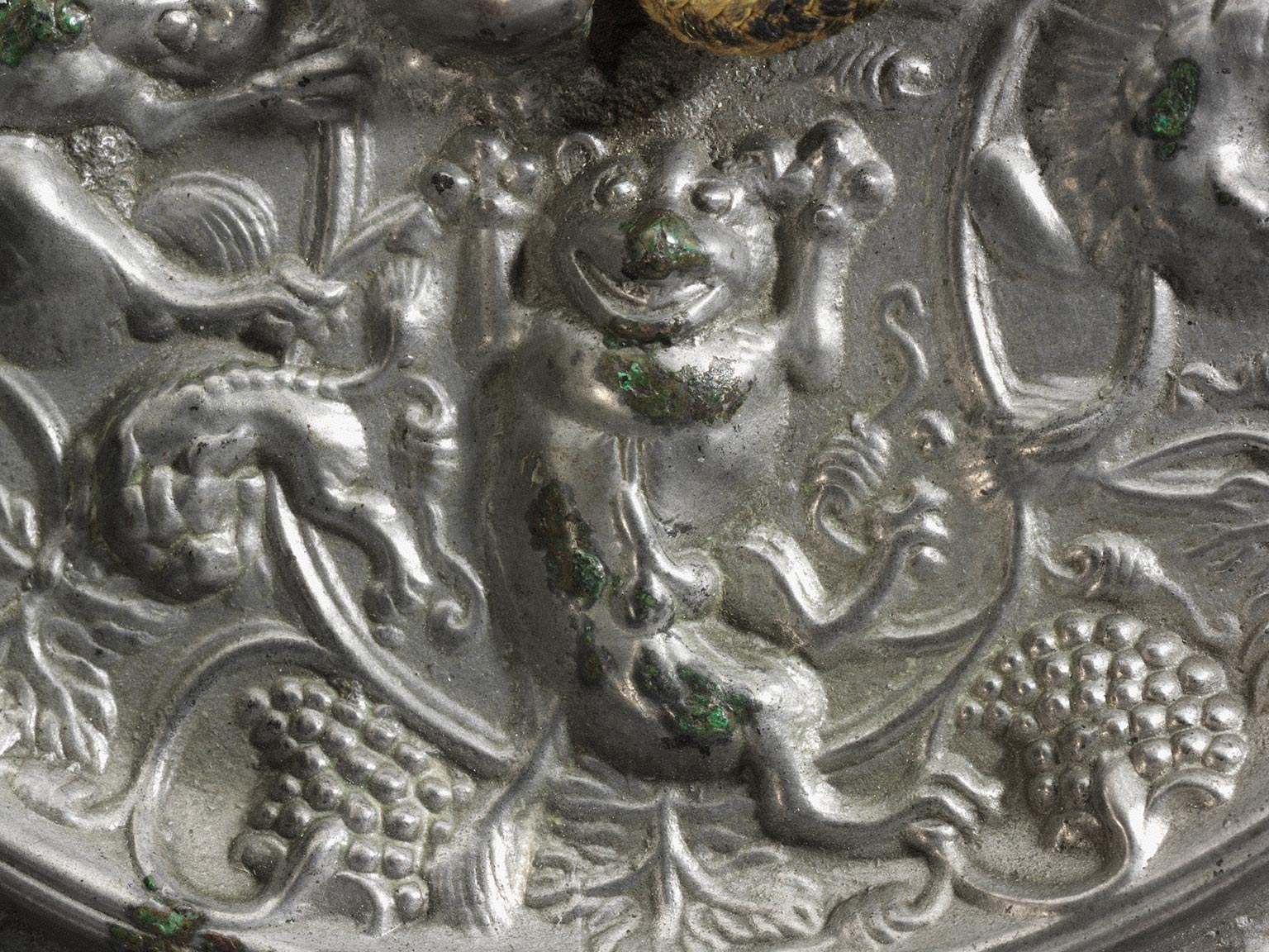 Bronze Mirror with Lions and Grapevines