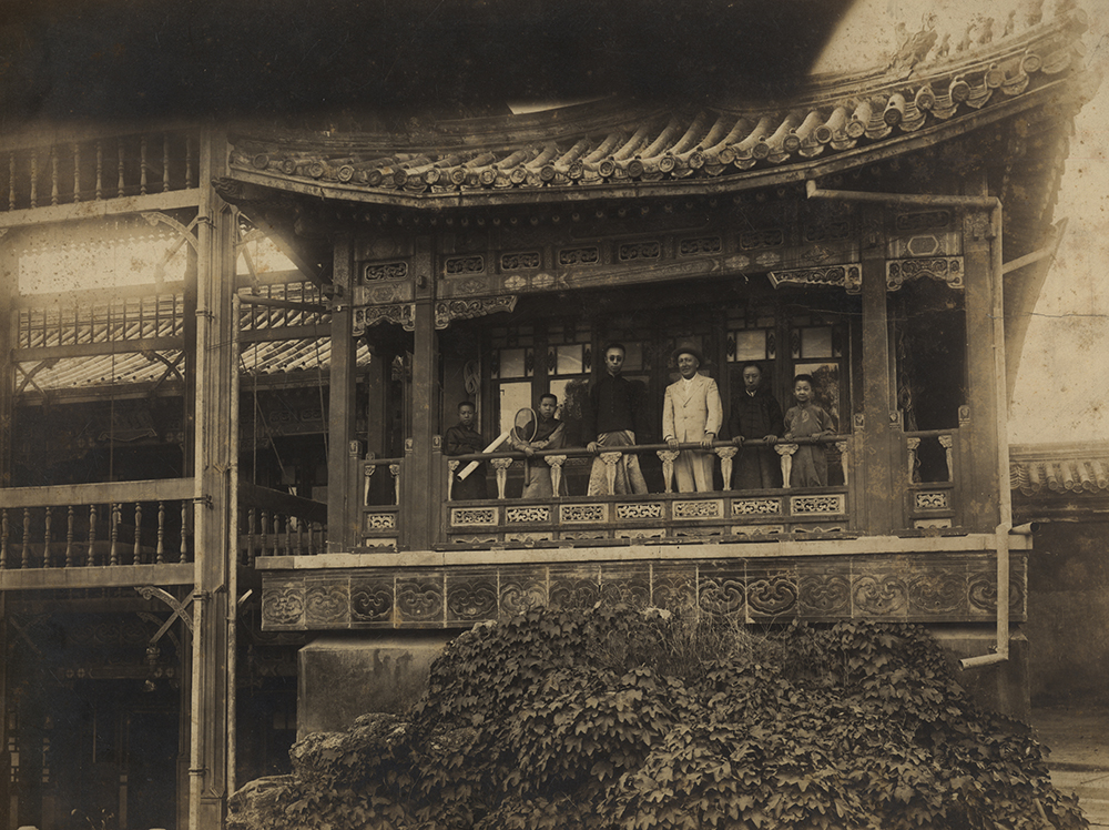 Reginald F. Johnston with Puyi, Pujie, and Runxi on the top floor of the Yangxinzhai Studio