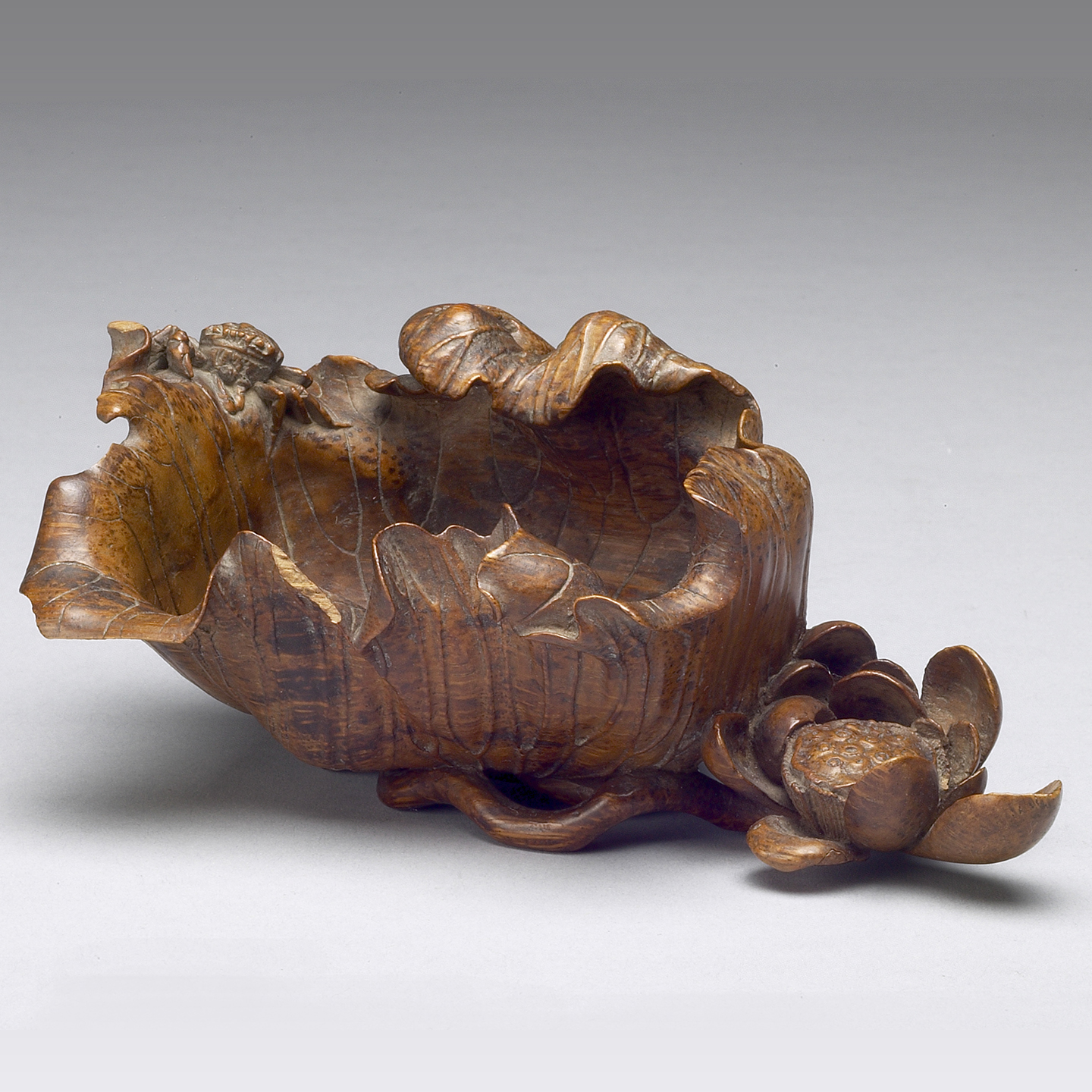 Carved bamboo brush washer in the form of a lotus leaf