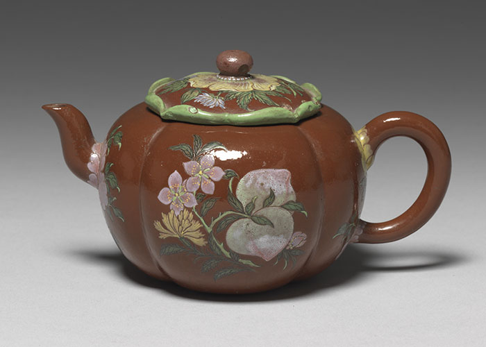 Yixing begonia-style teapot with longevity decorations in painted enamels