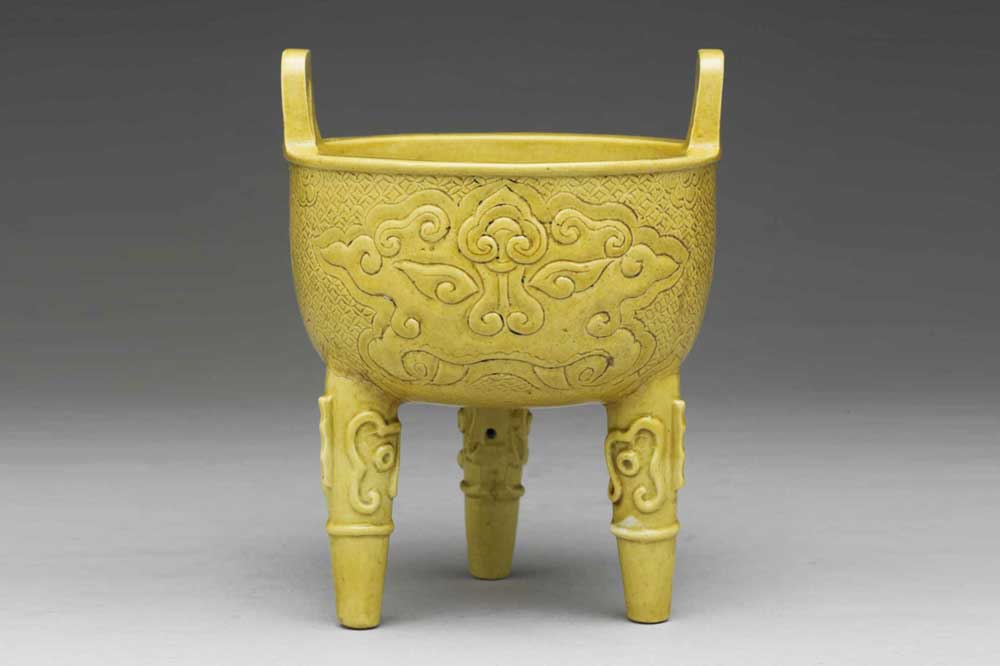 Porcelain Tripod with Animal-mask Design and Arch Handles in Yellow glaze
