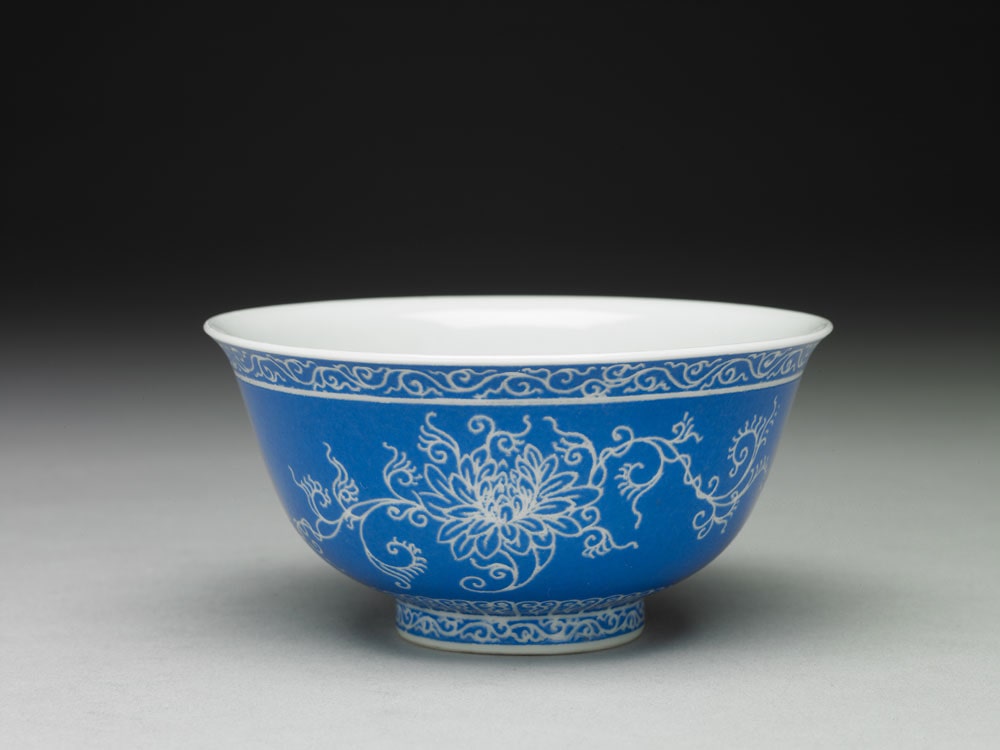 Tea bowl with Indian lotus carved on a blue ground in falangcai painted enamels