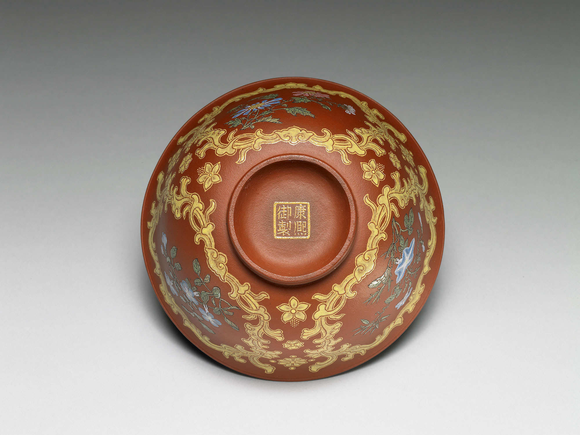 Yixing tea bowl with flowers in painted enamels