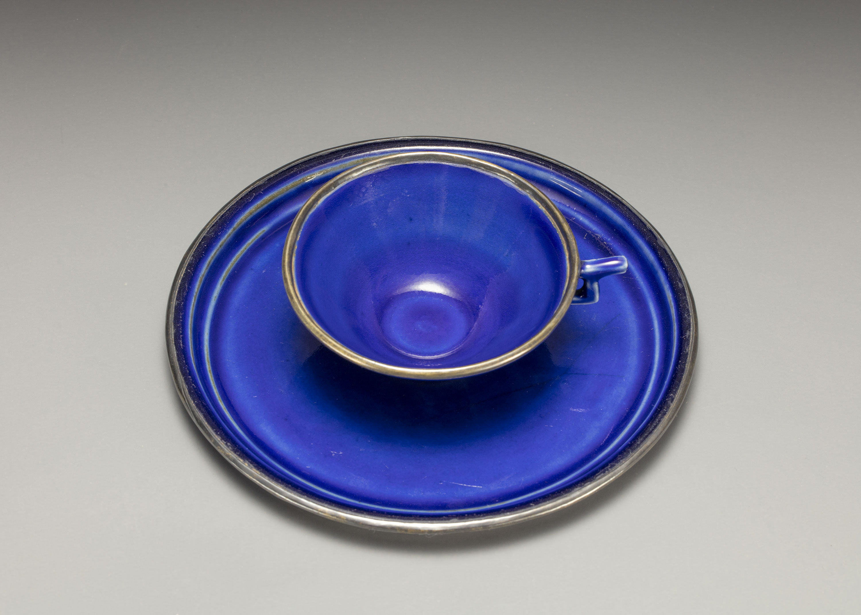 Cup and saucer in cobalt blue glaze
