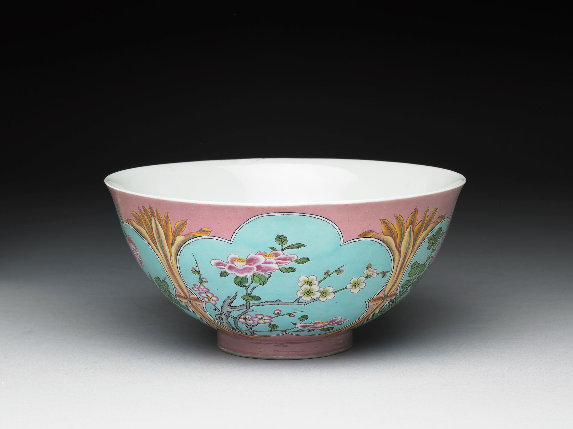 Bowl with flowers of the four seasons on a pink ground in painted enamels