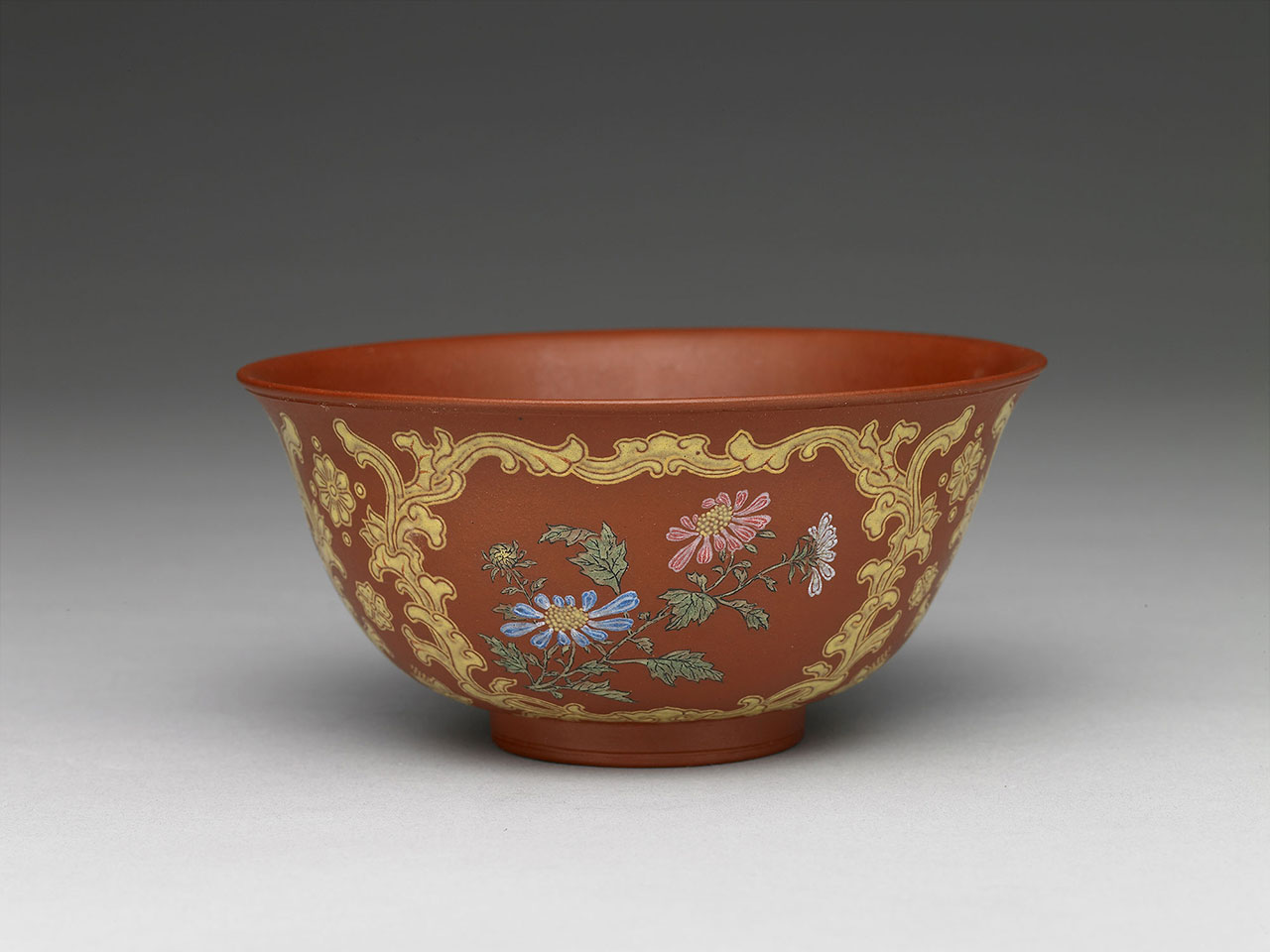 Yixing tea bowl with flowers in painted enamels
