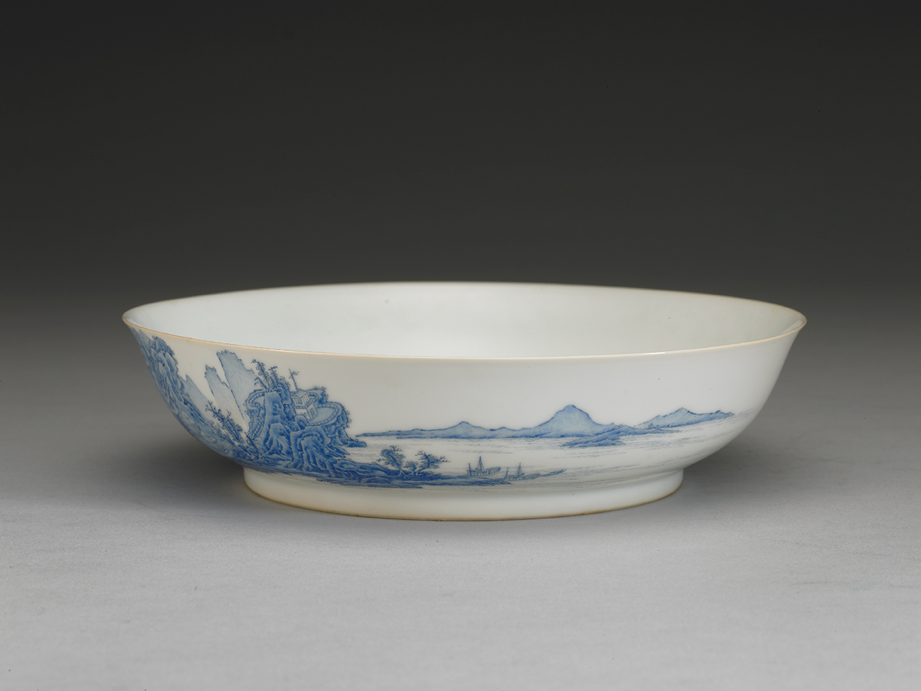 Dish with blue landscape in falangcai painted enamels