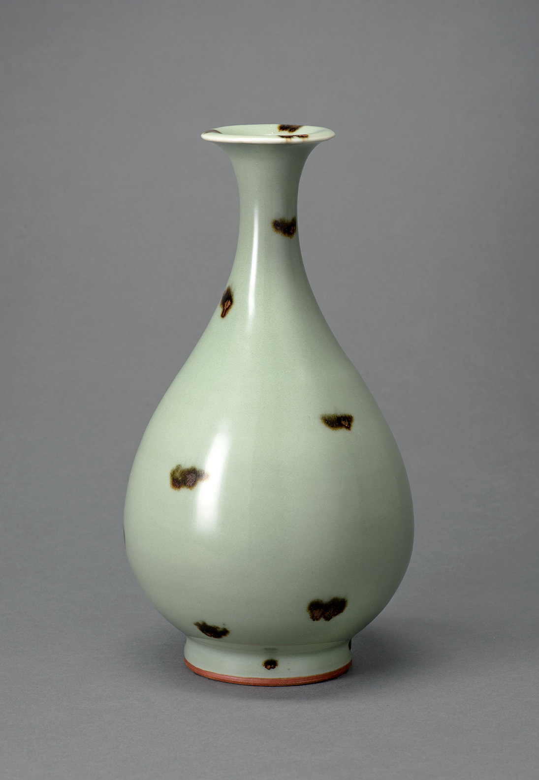 Yuan dynasty, 14th century Longquan ware Bottle with iron brown spots against celadon glaze