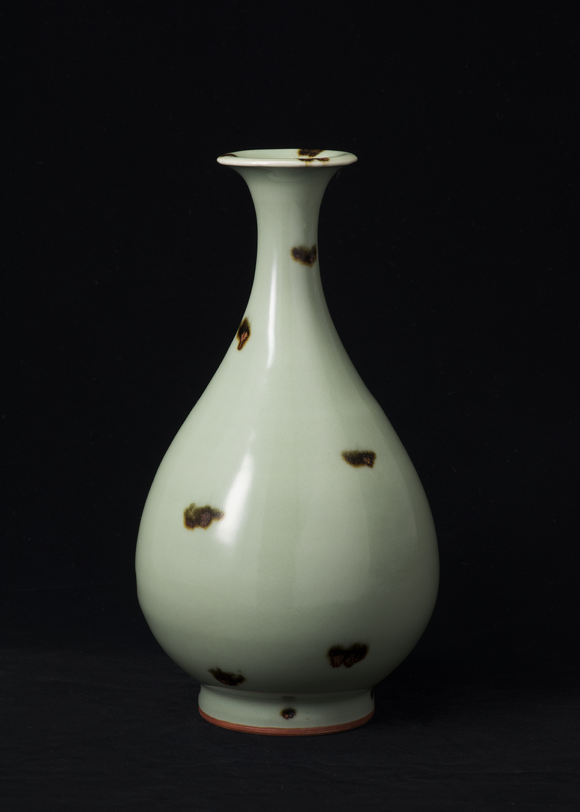 Yuan dynasty, 14th century Longquan ware Bottle with iron brown spots against celadon glaze