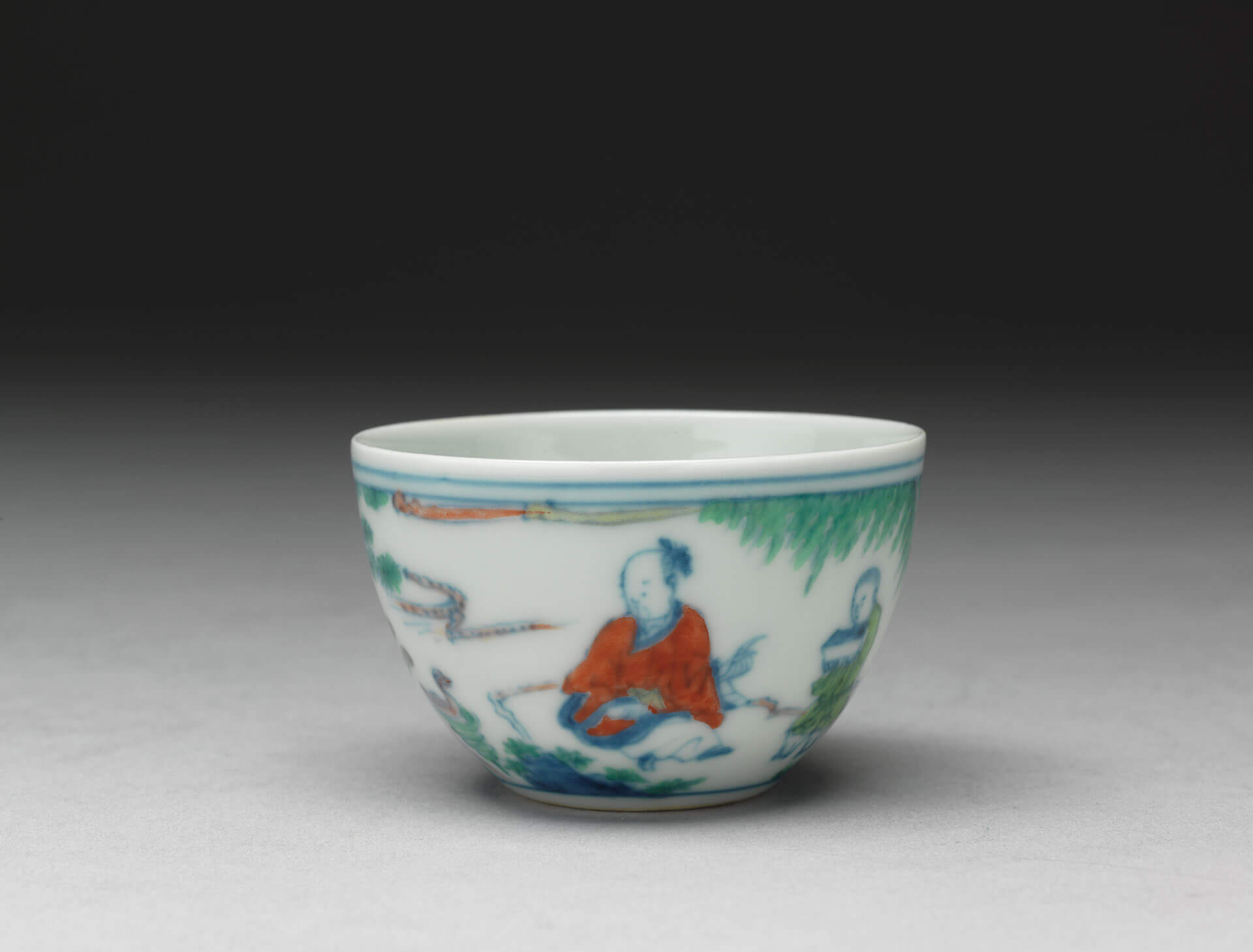 Cup decorated with figures in doucai polychrome enamels
