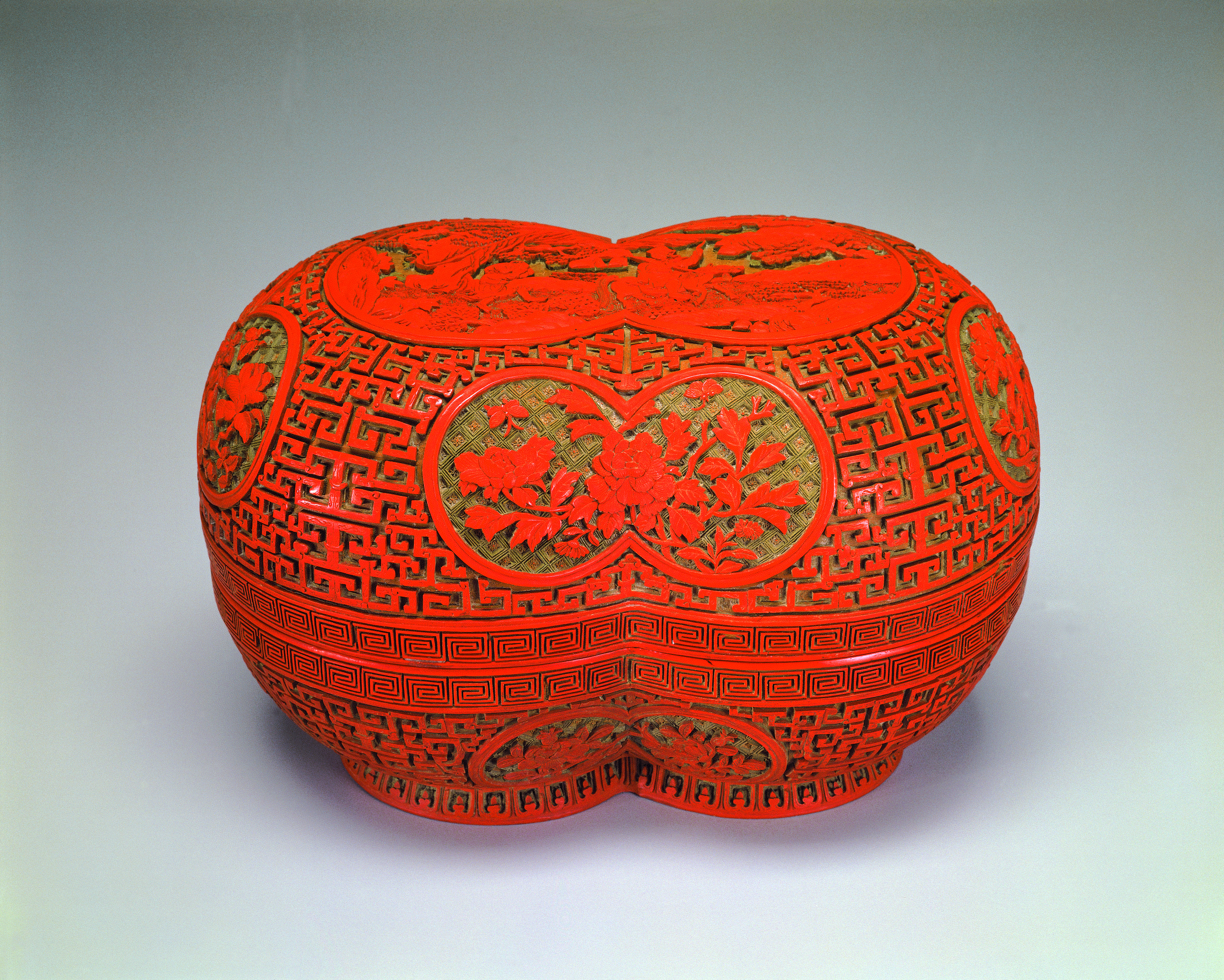 Two Round Conjoined Containers in Carved Red Lacquer
