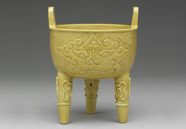 Bright Yellow Ting with Animal-mask Patterns in Relief