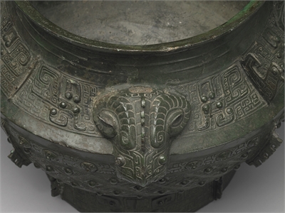 Lei wine vessel with goat-head high reliefs and knob pattern