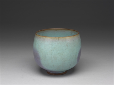 Bowl with sky-blue glaze and purple splashes