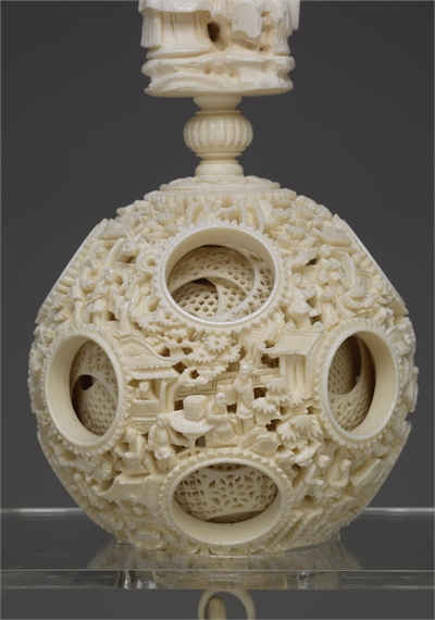 Ivory balls of nested concentric layers with human figures in openwork relief