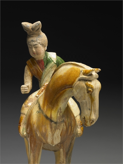 Pottery figure of ladies playing polo game in sancai tri-color glaze, Tang dynasty (AD618-907)